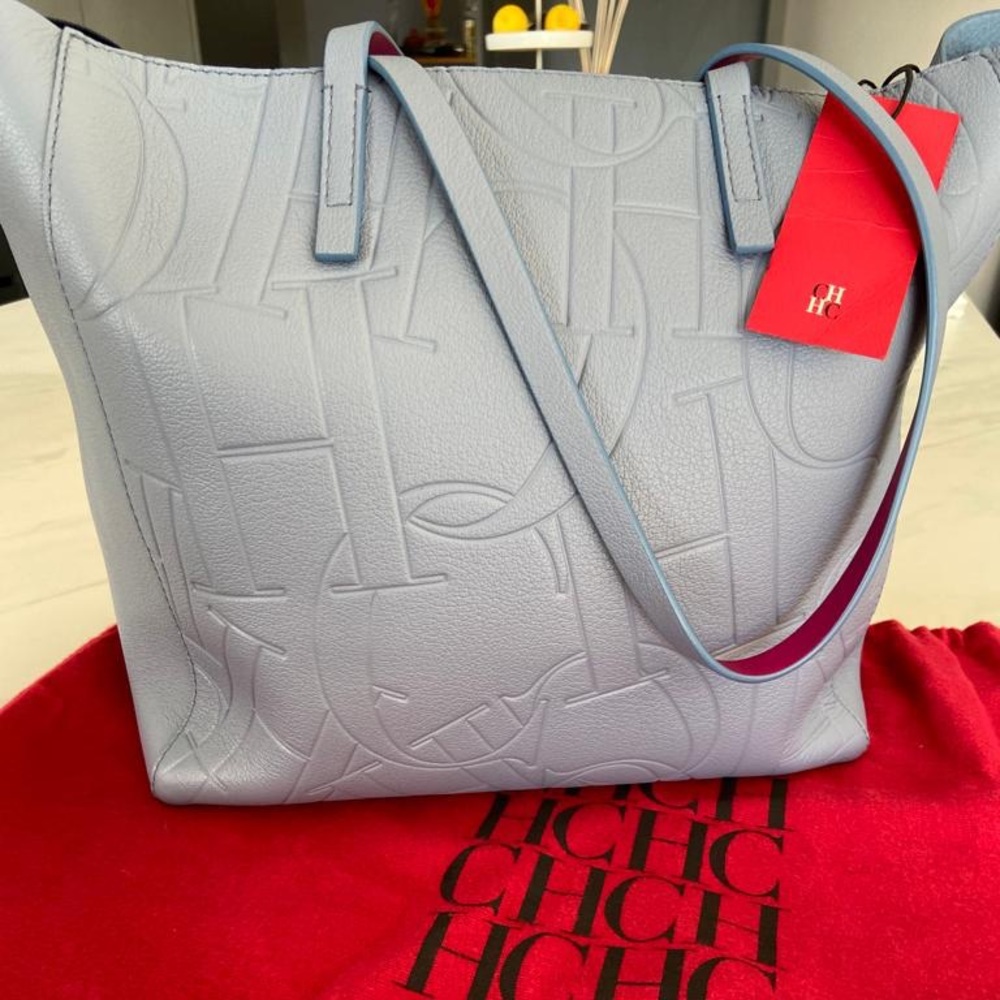Carolina Herrera beautiful bag. Light blue color with pink detail. NWT
